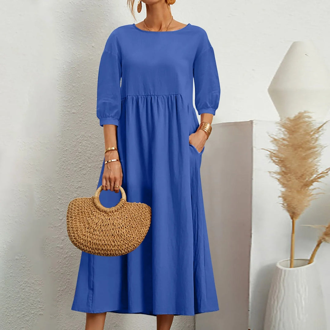 Celine - Elegancka sukienka midi z modnymi patchworkowymi detalami