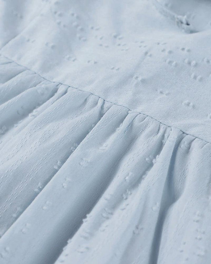 Szykowna i wyrafinowana damska sukienka koszulowa z długim rękawem na każdą okazję