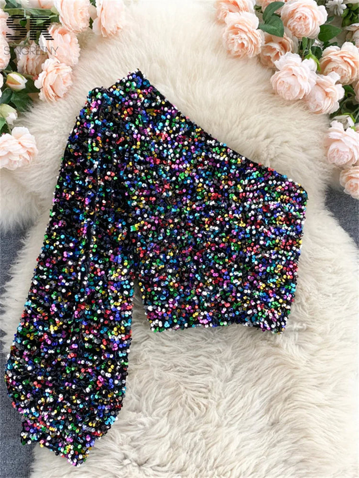 Stylowy top z paillettes na ramiączkach i eleganckimi bufiastymi rękawami