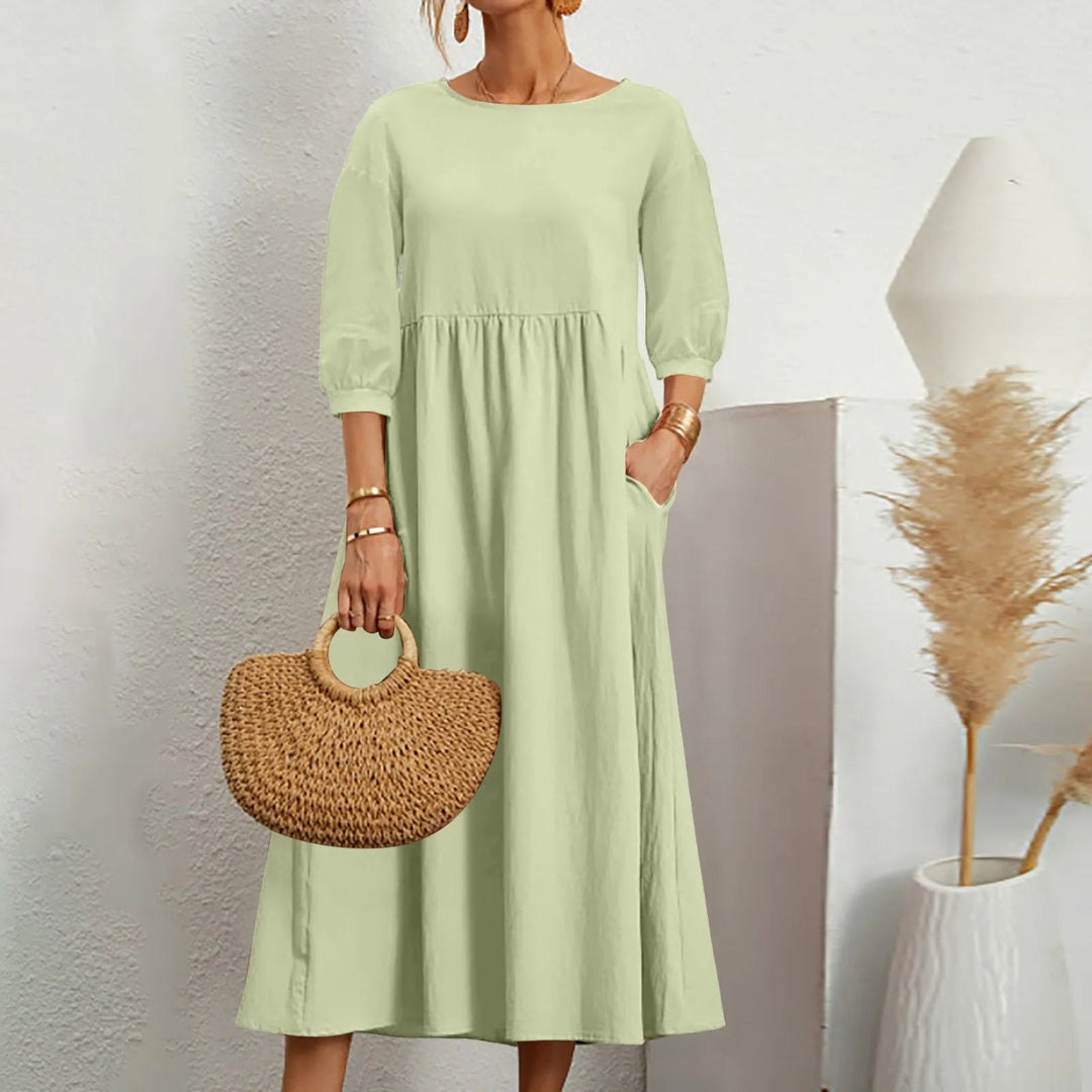 Celine - Elegancka sukienka midi z modnymi patchworkowymi detalami