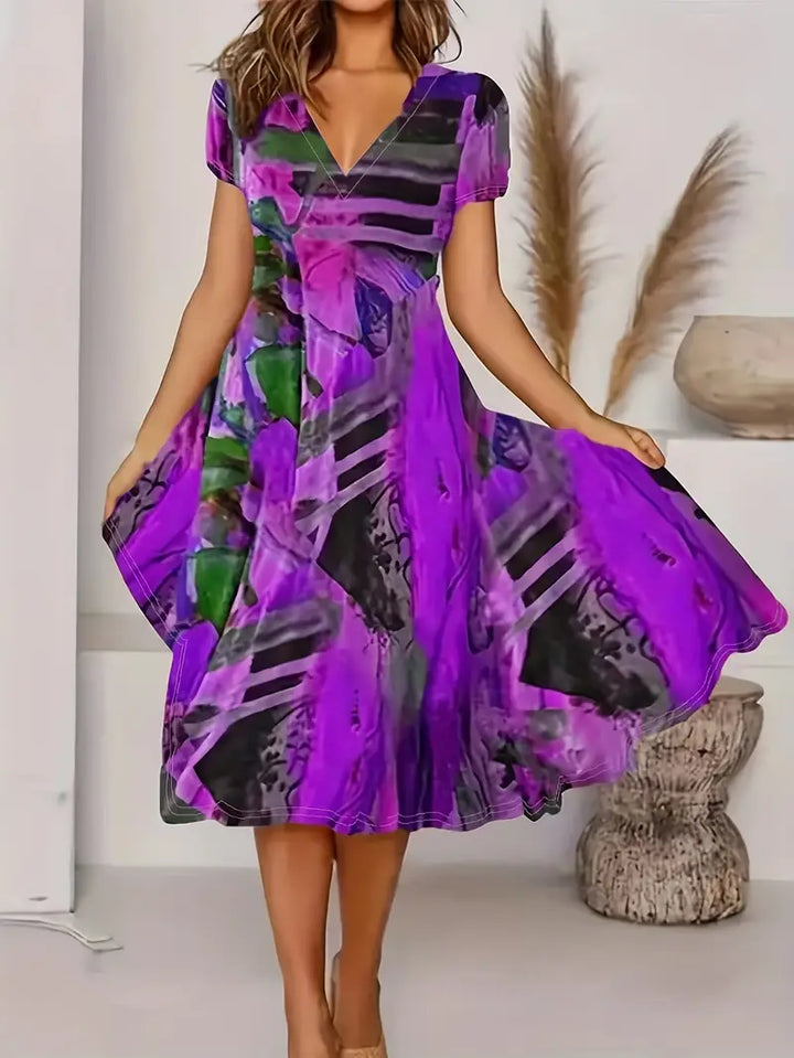 Elegant Women's V-Neck A-Line Dress with Short Puff Sleeves and Stylish Abstract Print Midi Length