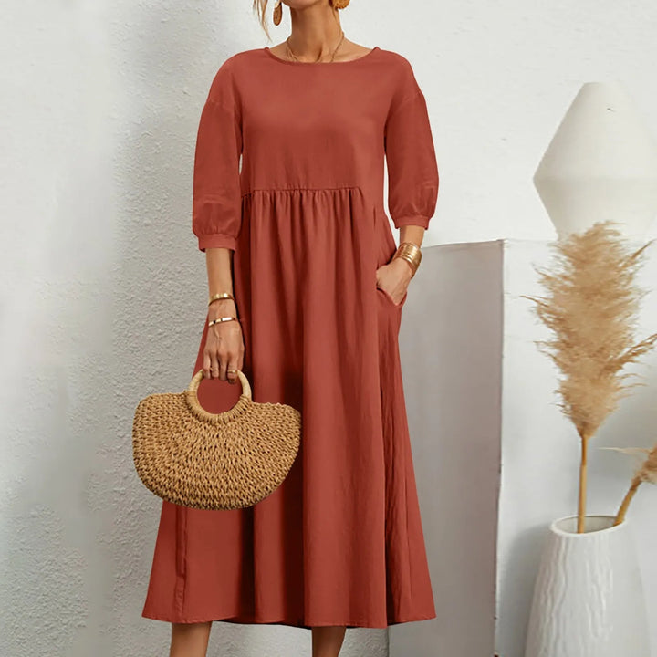 Celine - Elegancka sukienka midi z modnymi patchworkowymi detalami
