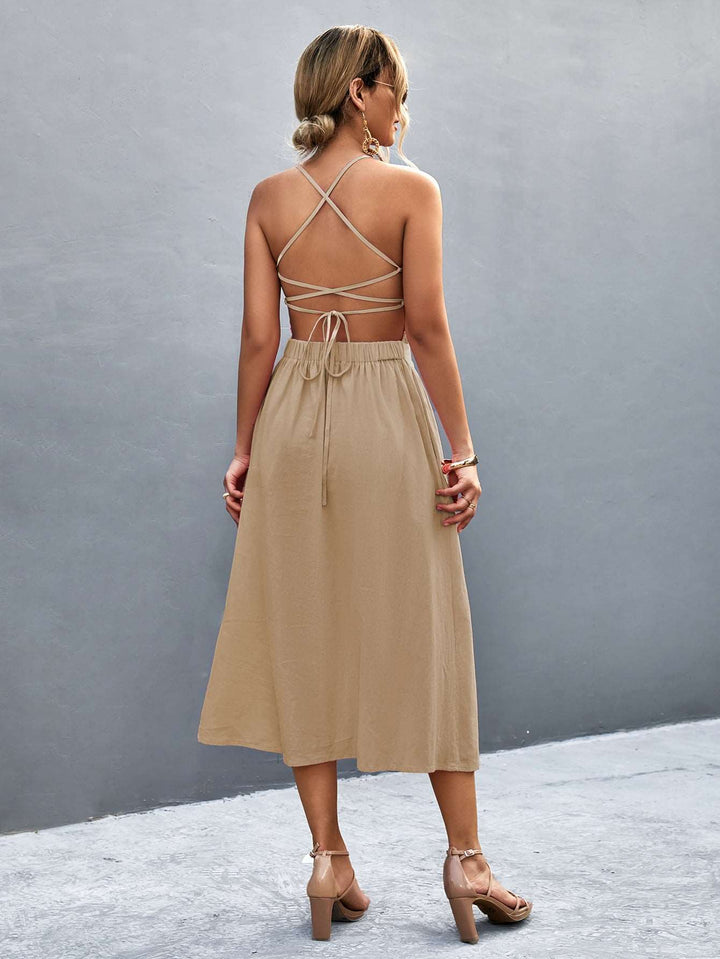 Elegant Women's Halter Neck Midi Dress with Sleeveless Button Front and Flowy A-Line Silhouette