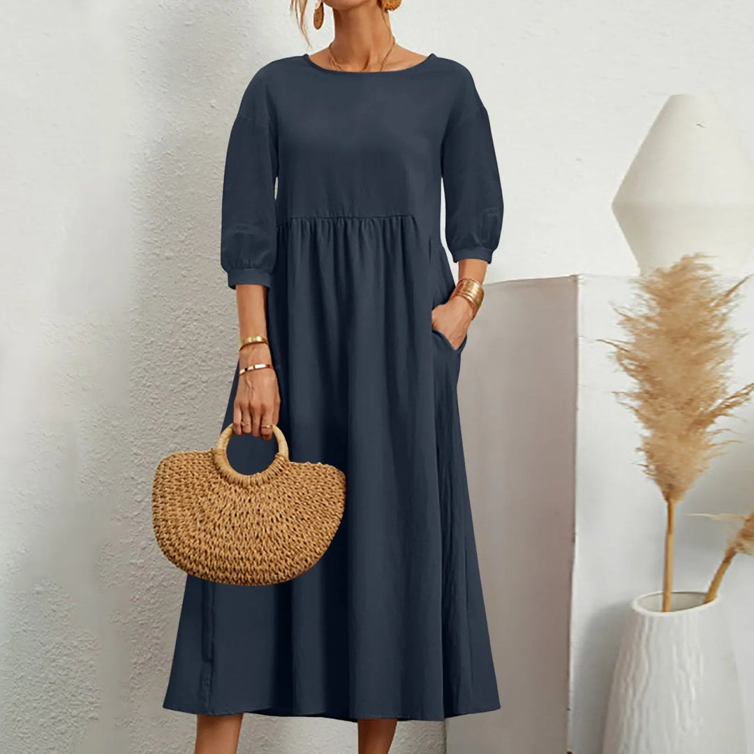 Celine - Elegancka sukienka midi z modnymi patchworkowymi detalami