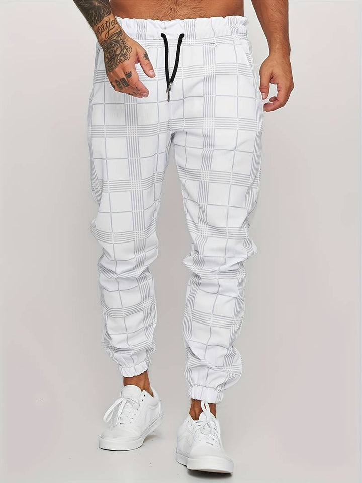 UrbanFit - Nowoczesne męskie joggery Slim Fit w kratkę zapewniające stylowy i wygodny wygląd