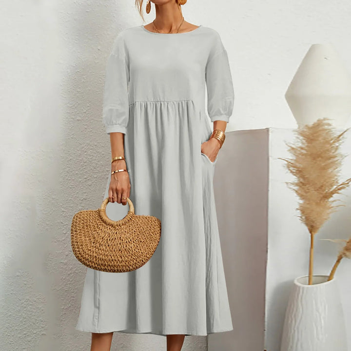 Celine - Elegancka sukienka midi z modnymi patchworkowymi detalami