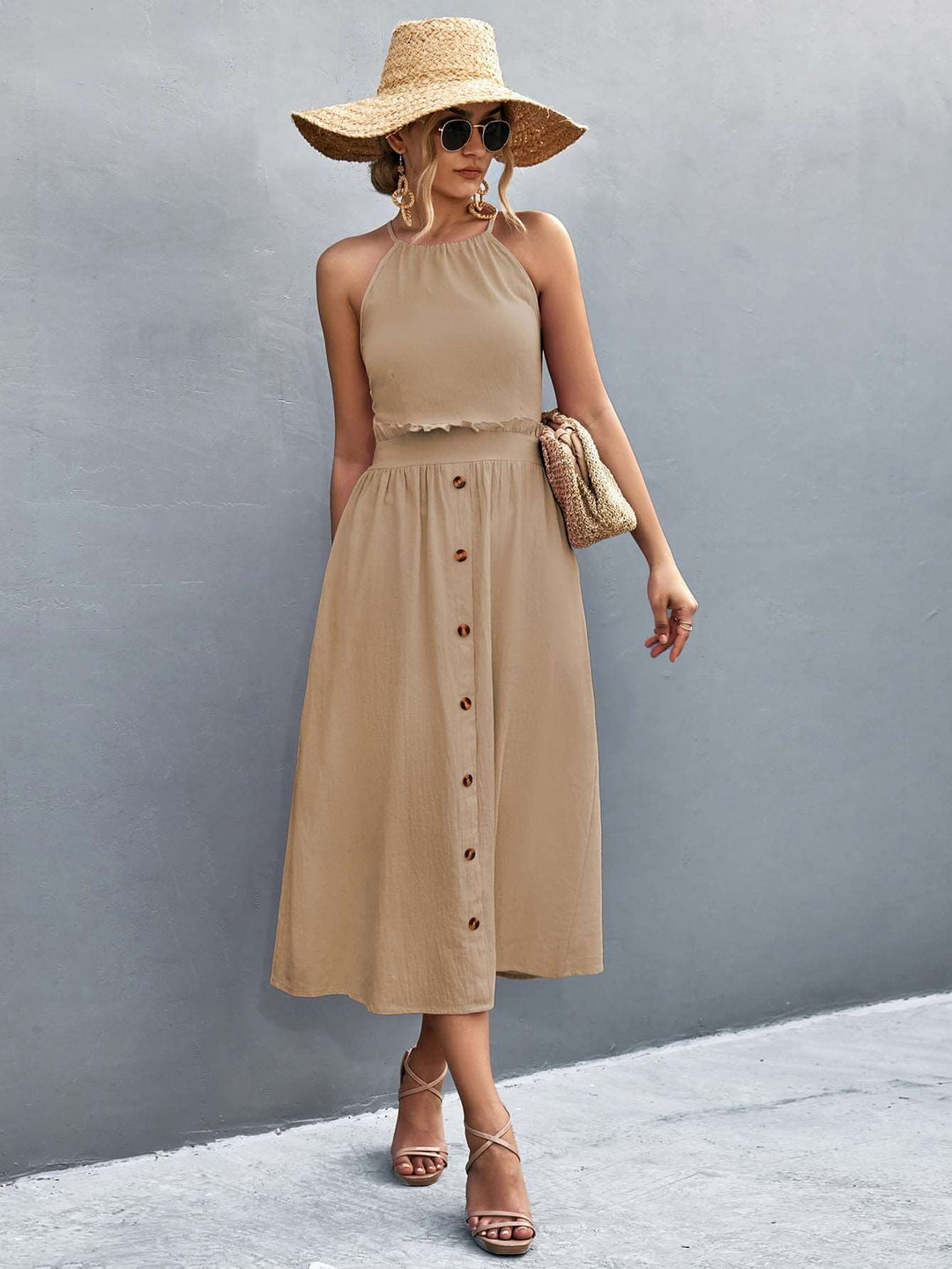 Elegant Women's Halter Neck Midi Dress with Sleeveless Button Front and Flowy A-Line Silhouette