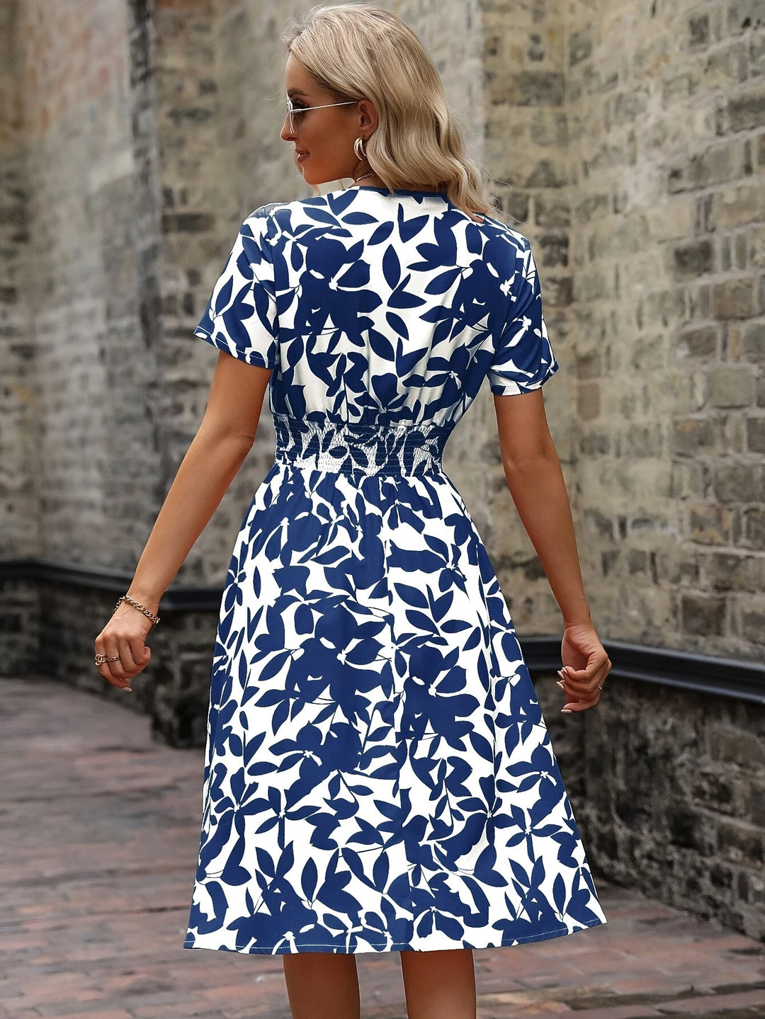 Chic Women's Midi Dress - Stunning Floral Print with Elegant Smocked Details