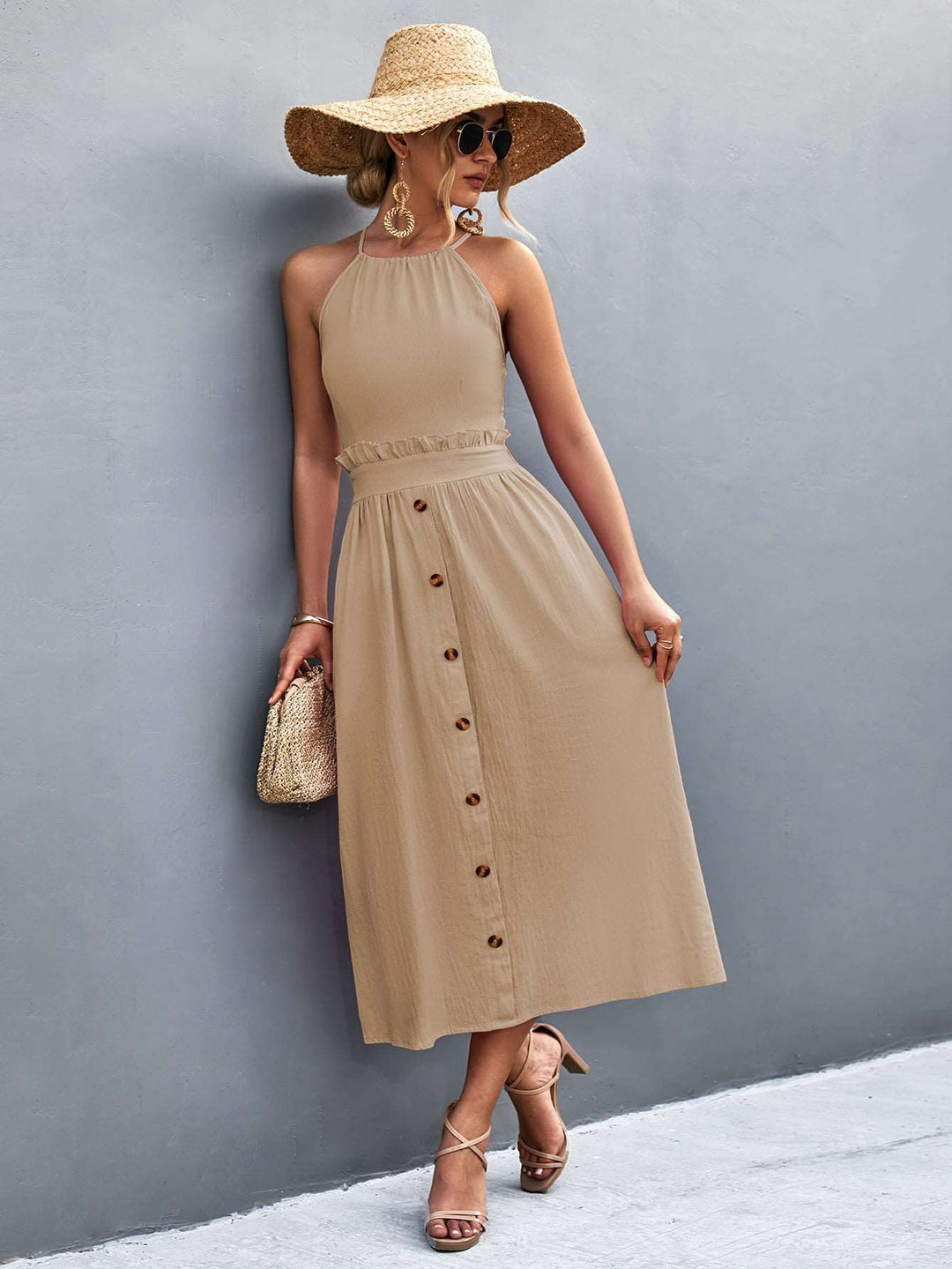 Elegant Women's Halter Neck Midi Dress with Sleeveless Button Front and Flowy A-Line Silhouette