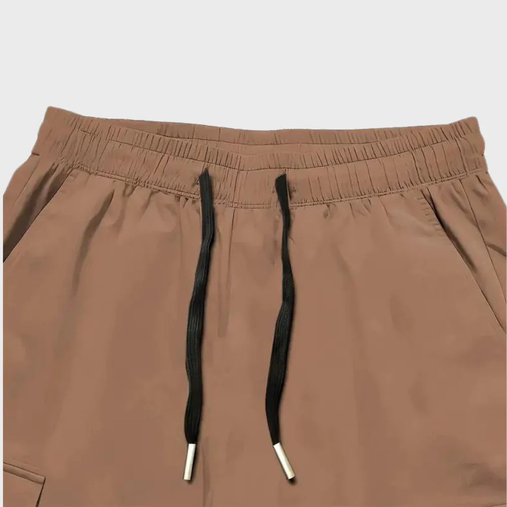 Finn - Męskie spodnie Slim Cross Pants zapewniające nowoczesny i wygodny wygląd