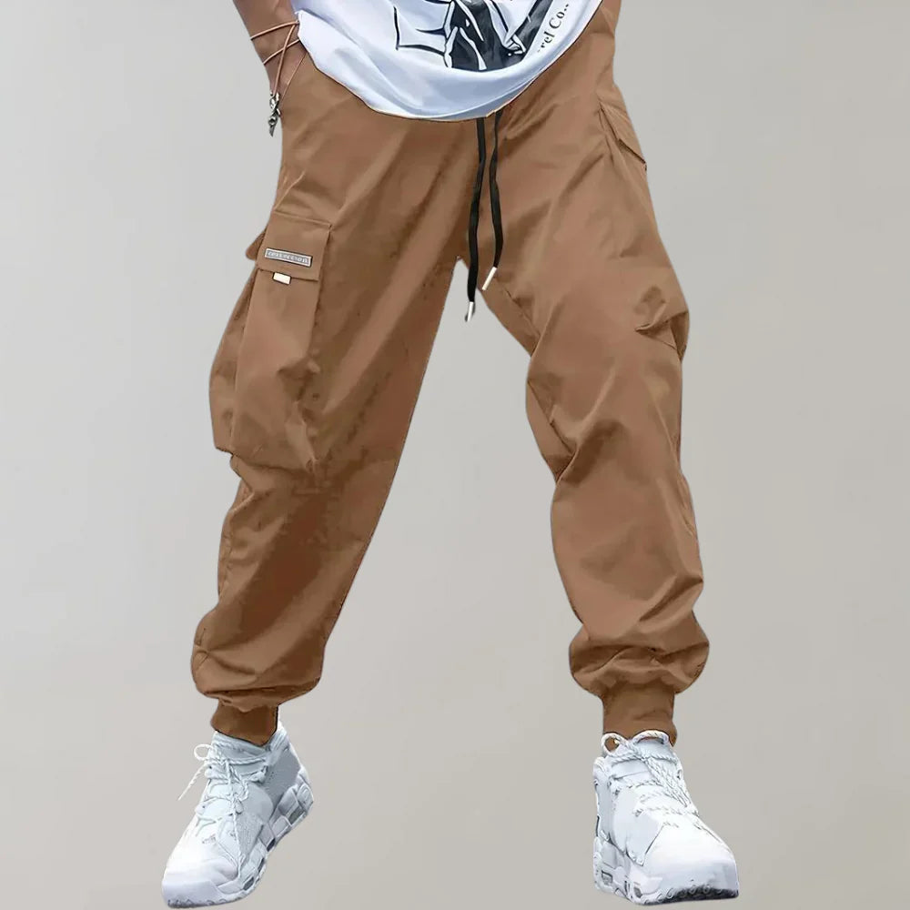 Finn - Męskie spodnie Slim Cross Pants zapewniające nowoczesny i wygodny wygląd