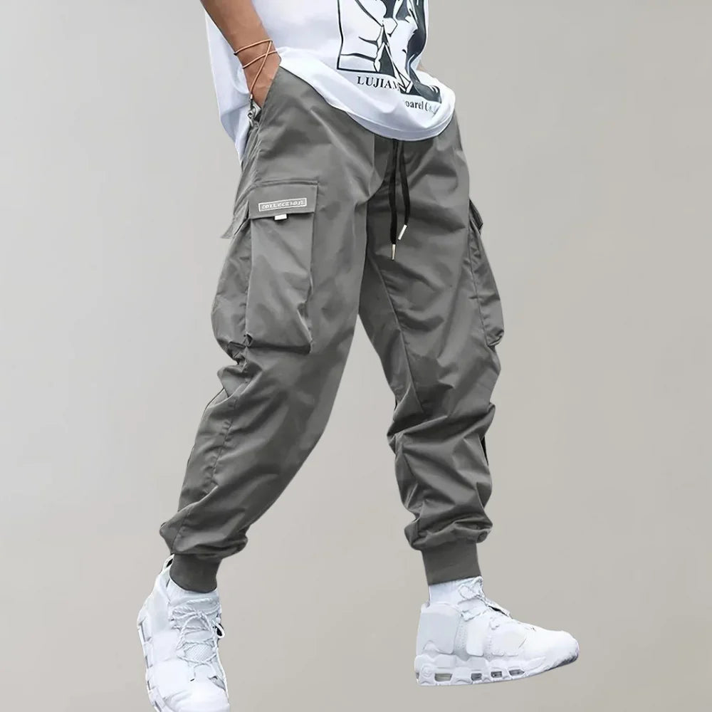 Finn - Męskie spodnie Slim Cross Pants zapewniające nowoczesny i wygodny wygląd
