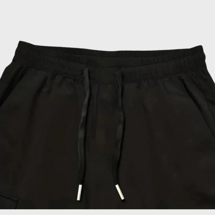 Finn - Męskie spodnie Slim Cross Pants zapewniające nowoczesny i wygodny wygląd