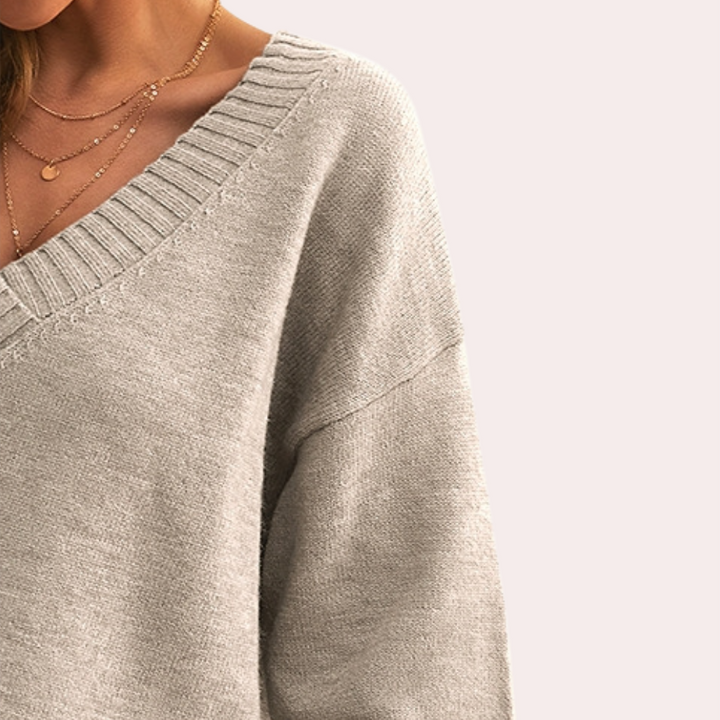 Damski sweter z dekoltem w szpic zapewniający szykowną elegancję