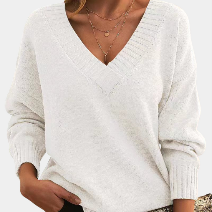 Damski sweter z dekoltem w szpic zapewniający szykowną elegancję