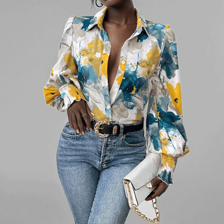 Kamizelka damska z botkami z regulacją oversize, manga abullonada, estampado floral y puños fruncidos