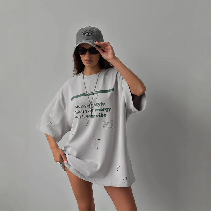 T-shirt damski oversize z bawełny melanżowej z grafiką vintage - style décontracté