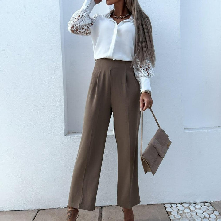 Bluzka damska z soi z długimi mankietami z wgłębieniami i guzikami - Elegancja w stylu intemporelle