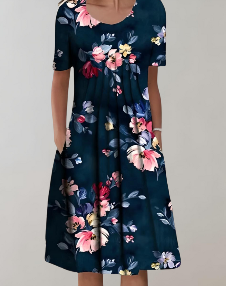 Eloise - Charmante Blumen-Smocks-Kleid mit Rundhalsausschnitt und praktischen Taschen