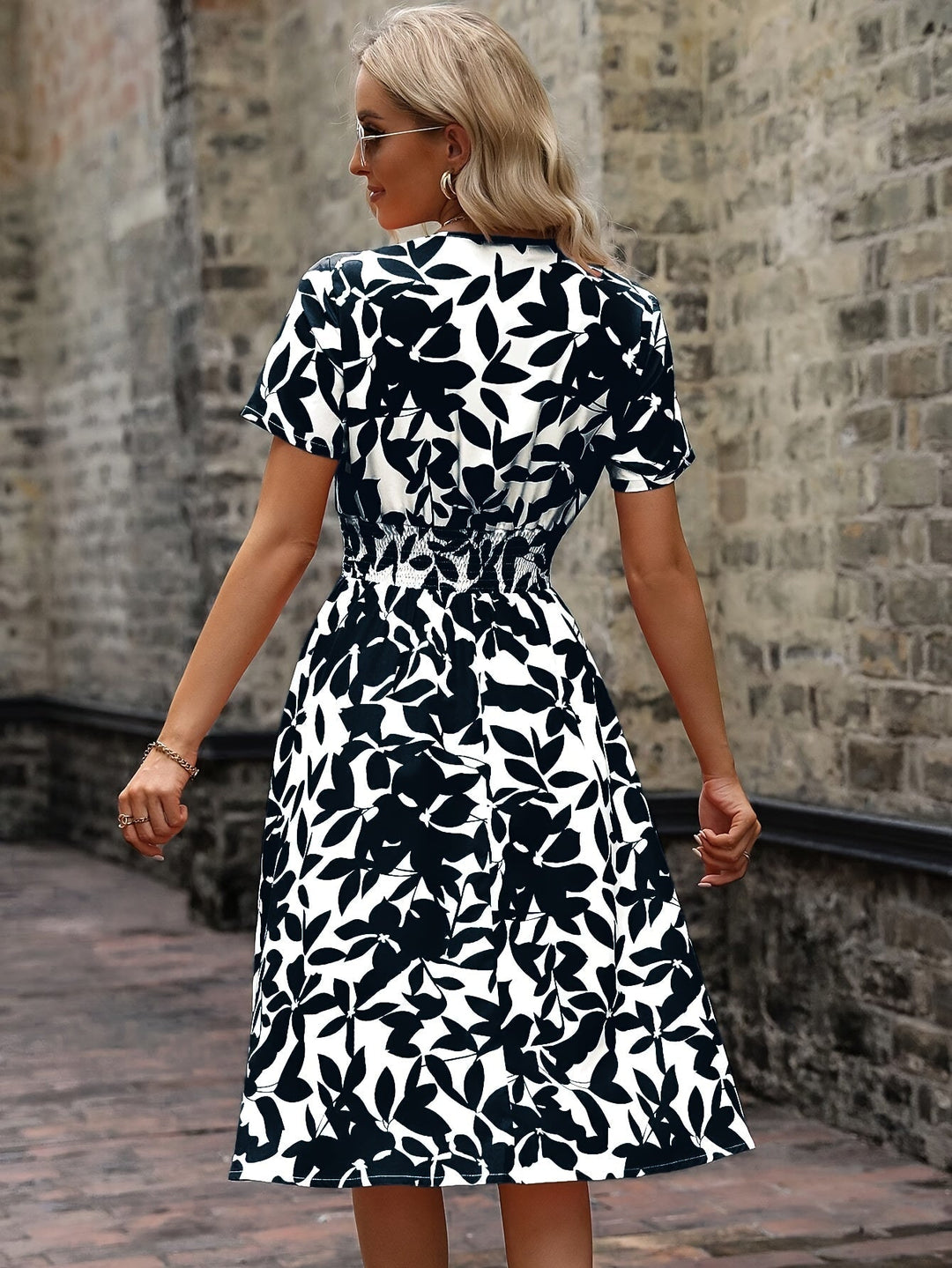 Chic Women's Midi Dress - Stunning Floral Print with Elegant Smocked Details