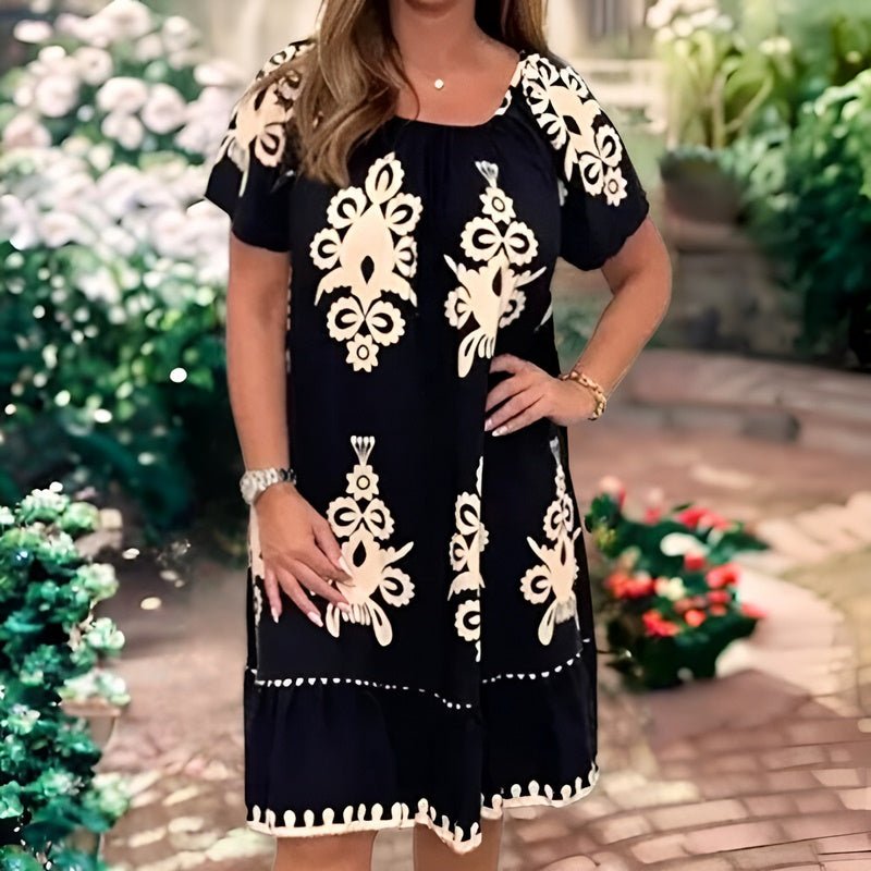 Elegant Women's Knee-Length Dress with Short Sleeves and Loose Fit Featuring Beautiful Pattern