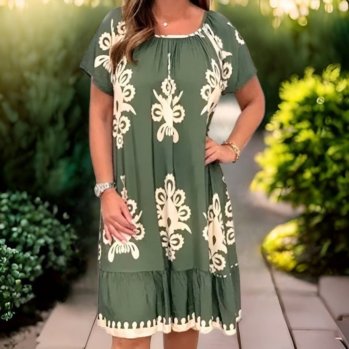 Elegant Women's Knee-Length Dress with Short Sleeves and Loose Fit Featuring Beautiful Pattern