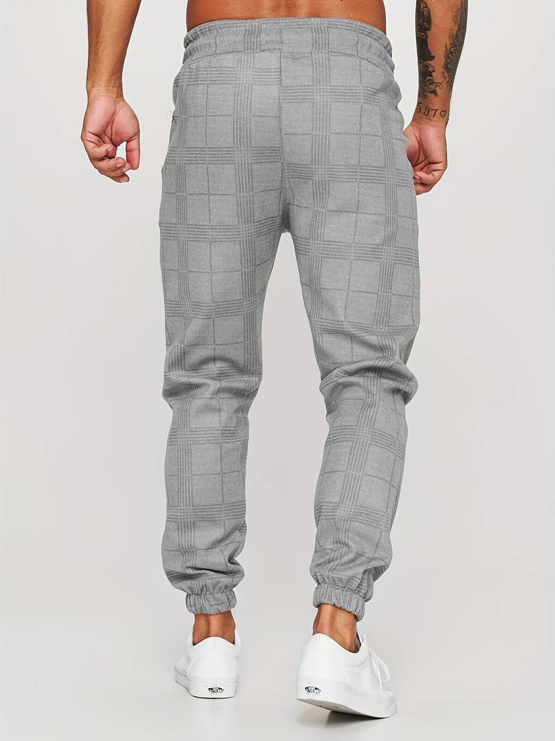 UrbanFit - Nowoczesne męskie joggery Slim Fit w kratkę zapewniające stylowy i wygodny wygląd