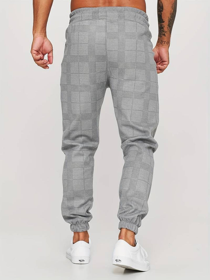 UrbanFit - Nowoczesne męskie joggery Slim Fit w kratkę zapewniające stylowy i wygodny wygląd