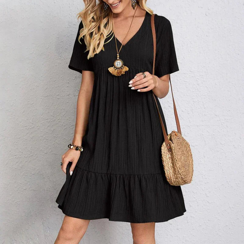 Chic Women's Casual Dress with V-Neck, Short Sleeves, Ruffled Hem, Relaxed Fit, and Knee-Length Style