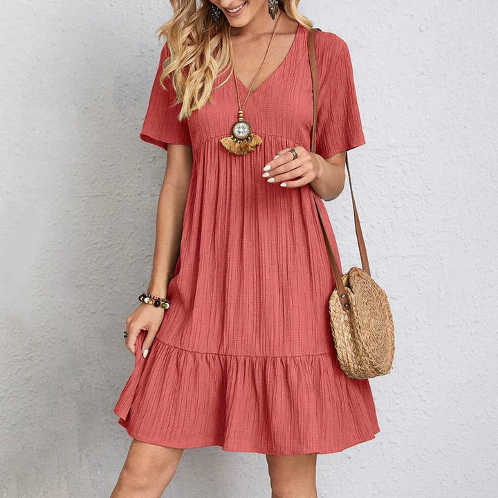 Chic Women's Casual Dress with V-Neck, Short Sleeves, Ruffled Hem, Relaxed Fit, and Knee-Length Style